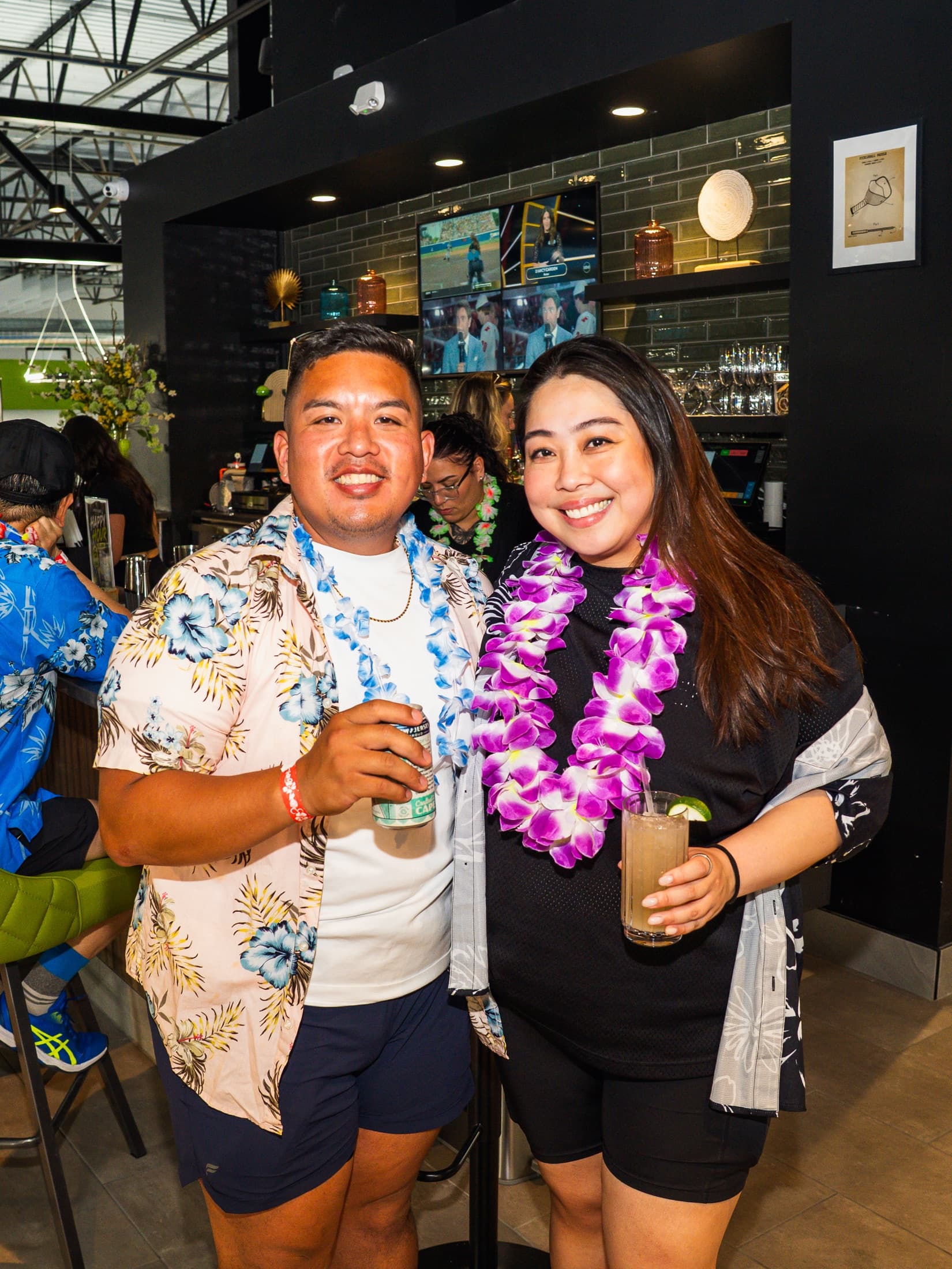 Guests smiling at The Upper Court bar