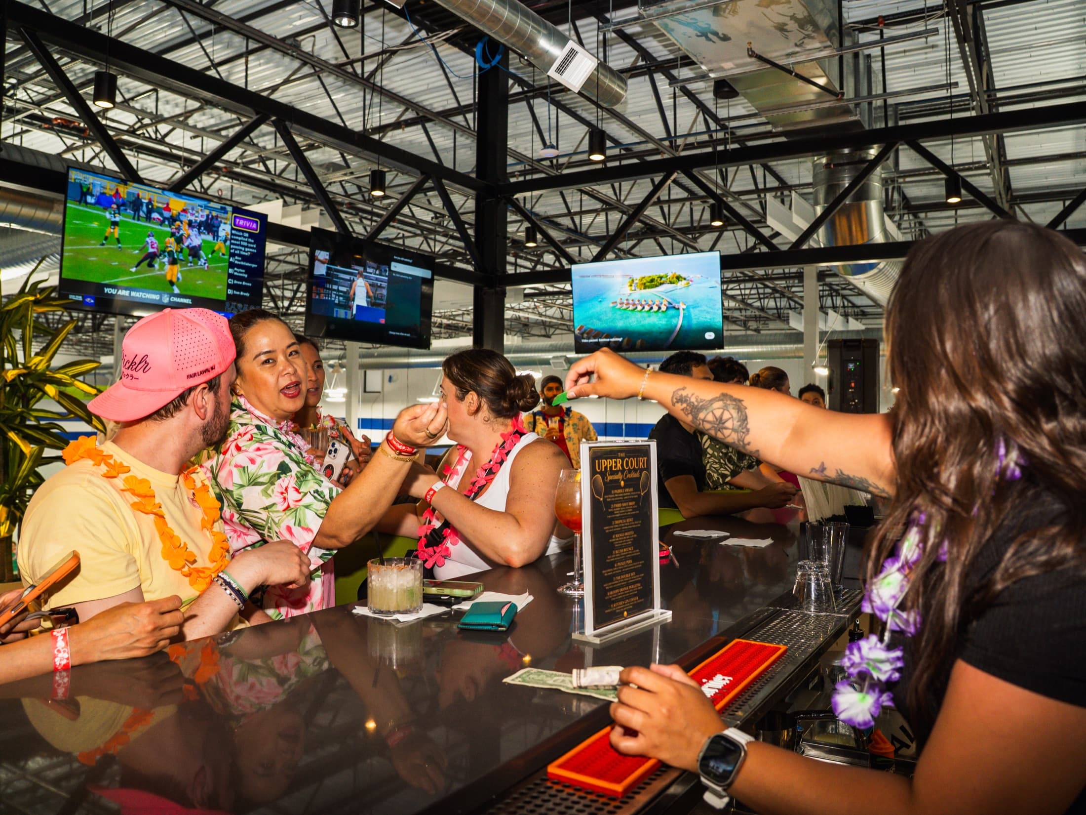 Guests at The Upper Court sports lounge