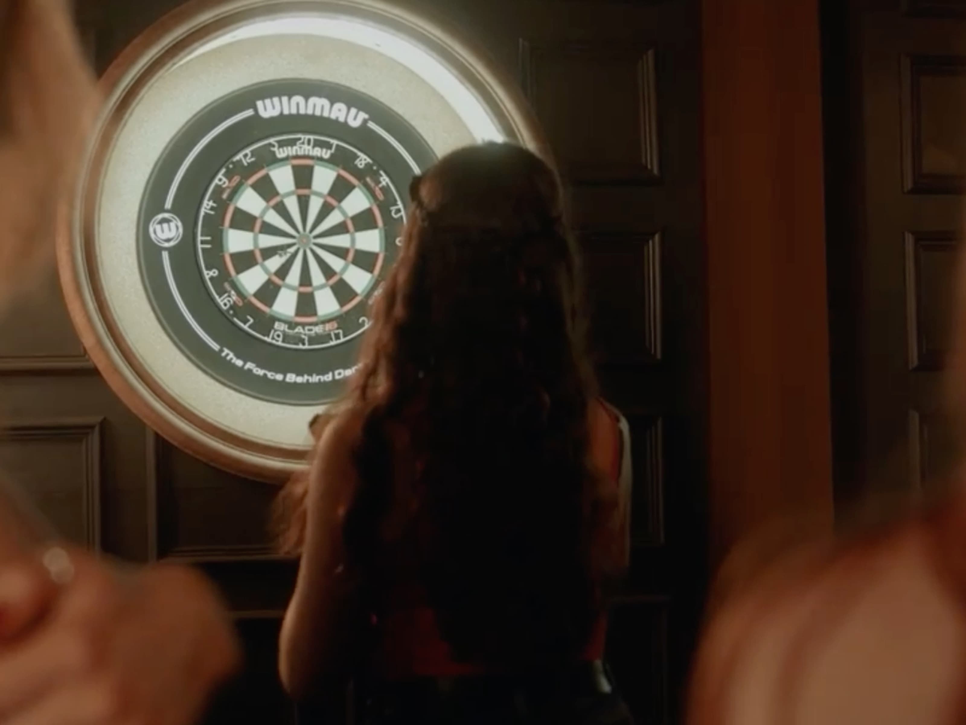 Guest playing interactive Dartsee during a private party at The Upper Court